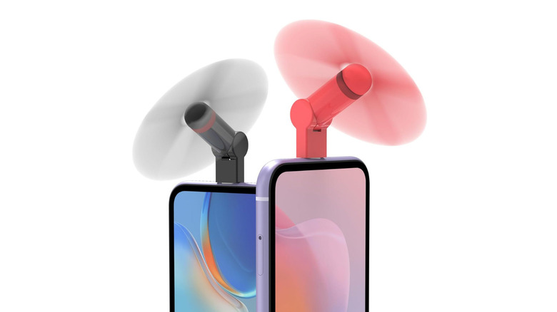A pair of Type C Mini Fans attached to smartphones