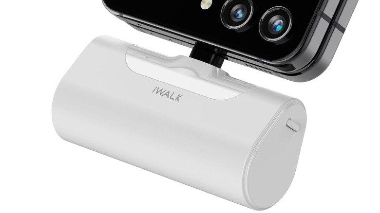 The iWalk Portable USB-C Charger plugged into a smartphone.