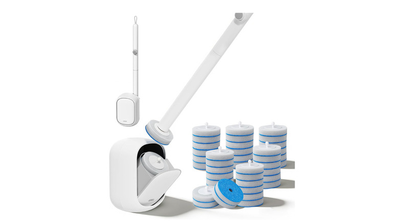 Disposable toilet brushwith replaceable heads