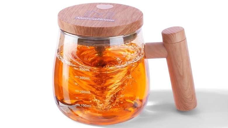 The NeovaHome Self Stirring Coffee Mug is pictured, with swirling liquid inside.