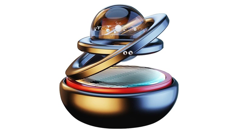 a closeup of the Kwak Solar Energy Rotating Car Air Freshener