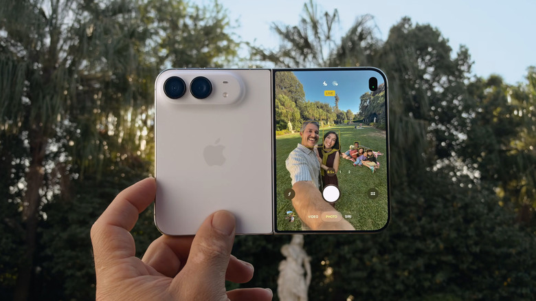 People taking selfie with the iPhone Duo