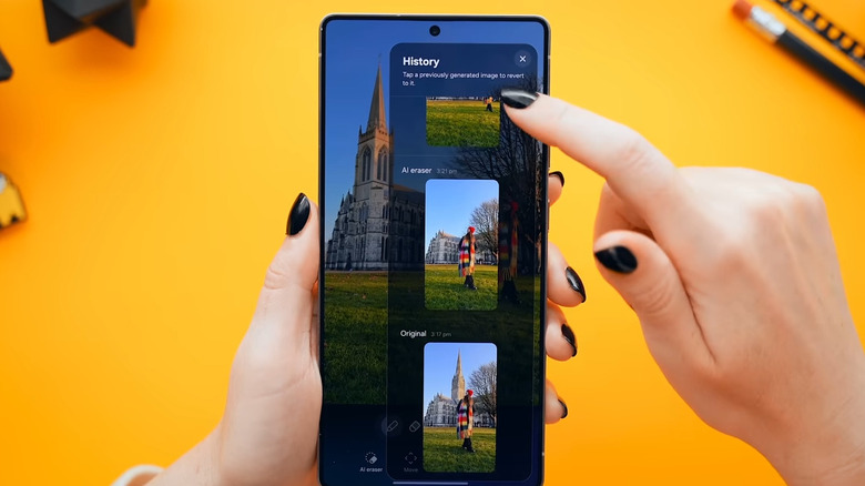 Hand holding Galaxy phone showing edit History in Photo Assist