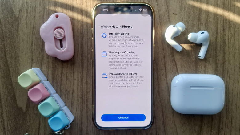 iPhone showing What's New in Photos screen