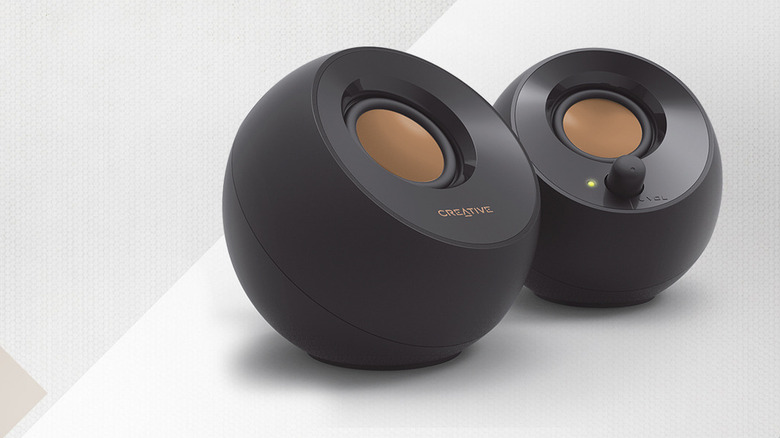 A pair of black Creative Pebble 2.0 USB speakers.
