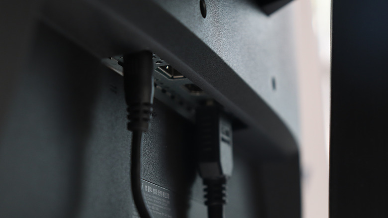 Monitor USB ports with connected cables.