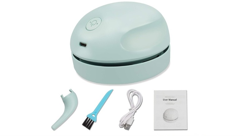 Pwrowithlin Desktop USB Vacuum Cleaner with cleaning brush, USB cable, and user manual.