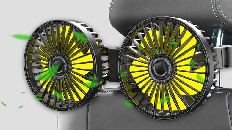 Qidoe Car Fan mounted to the headrest of a car seat