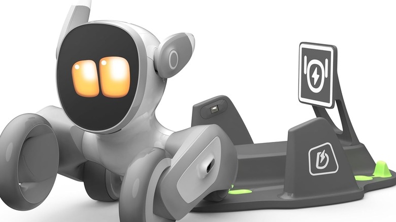 The Loona robot pet and its charging station.