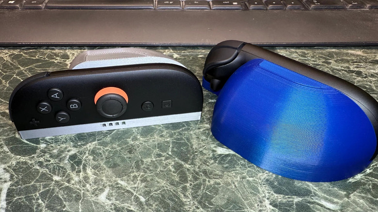 3D-printed mouse grip accessory attached to Nintendo Switch 2 Joy-Con controller.