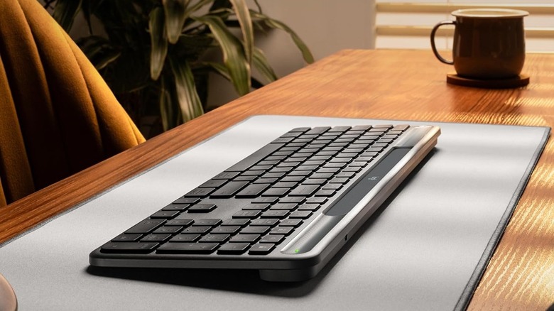 Logitech Signature Slim Solar+ K980 Keyboard sitting on deskpad on desk