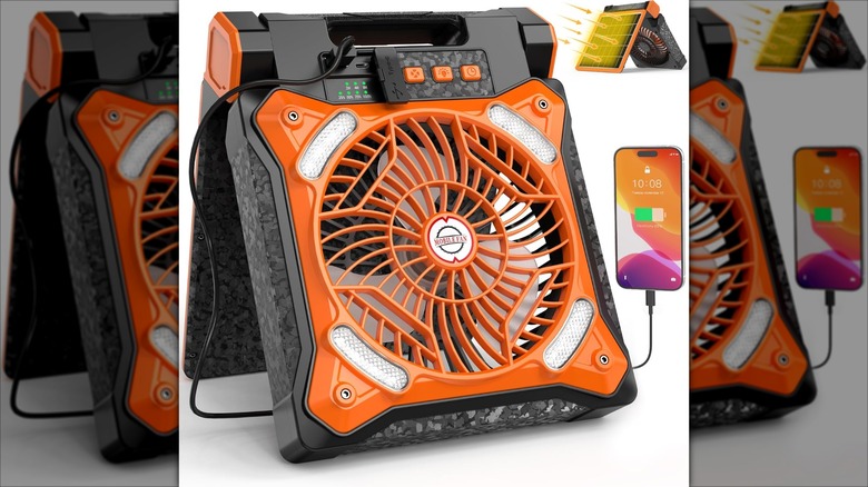 A Kitwlemen Solar Camping Fan connected to a phone.