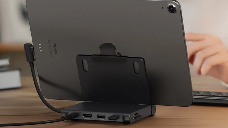 Woman using an iPad with Satechi's Foldable Stand Hub