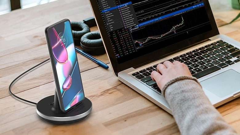 The Encased USB-C Phone Charger set up on a desk and connected to a laptop.