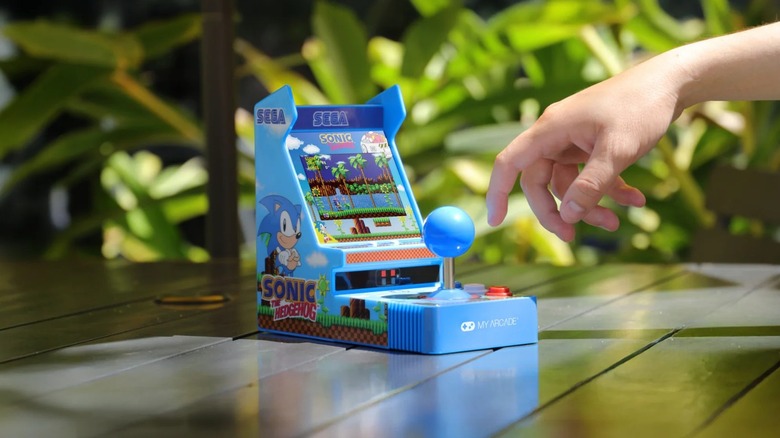 My Arcade: Sonic Joystick Player on table with plants in background