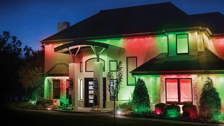 The eaves of a house lit up by Enbrighten Permanent Outdoor Wi-Fi Eternity Lights.