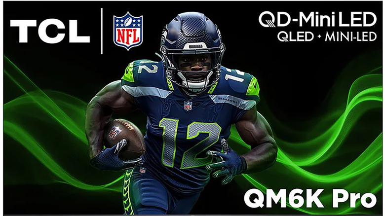 The TCL QM6K Pro TV with a football player on screen.