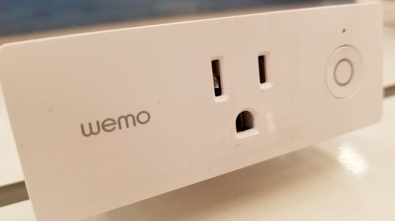 A white Belkin Wemo smart plug