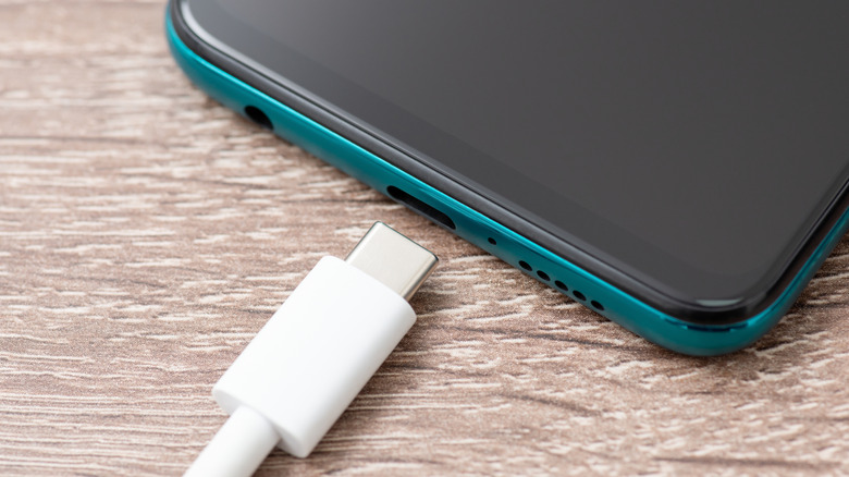 USB-C cable unplugged from phone with USB-C port