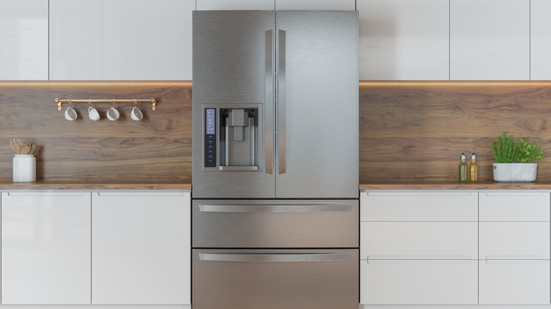 A large refrigerator in a kitchen.
