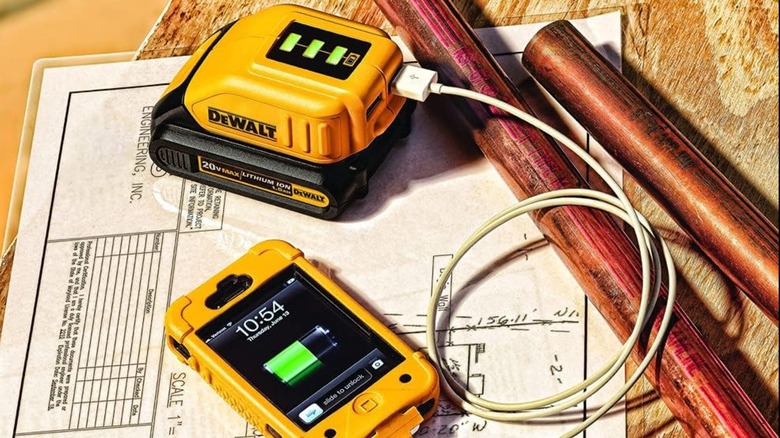 Charging a phone with the DeWalt USB charger.