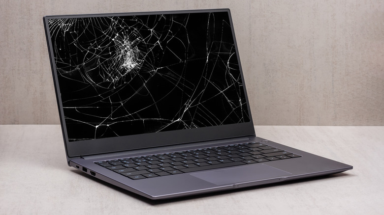 A laptop with a shattered display.