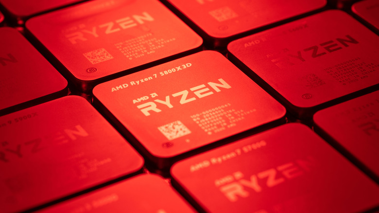 AMD Ryzen 7 5800X3D processor highlighted among other Ryzen chips under red lighting.