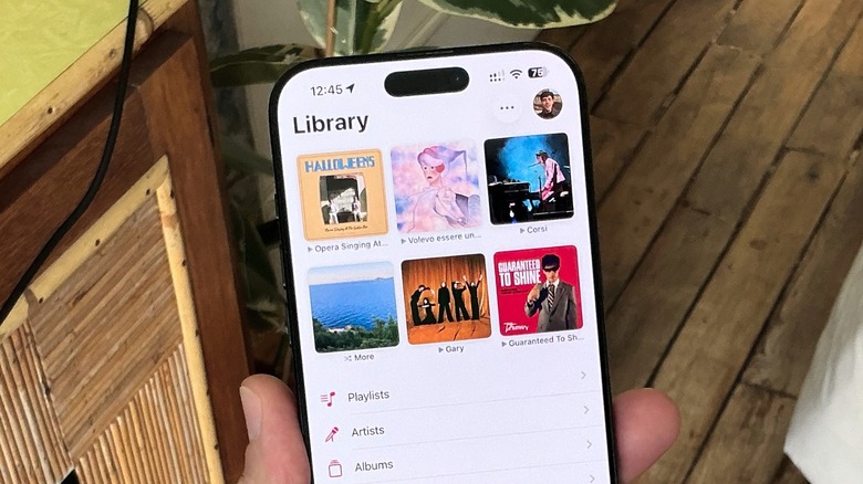 An iPhone displaying Apple Music's new pinned albums feature