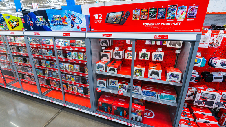 Nintendo Switch and Switch 2 games and accessories in a store.