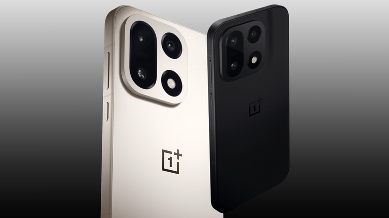OnePlus 15 in two colorways on a black to white gradient background
