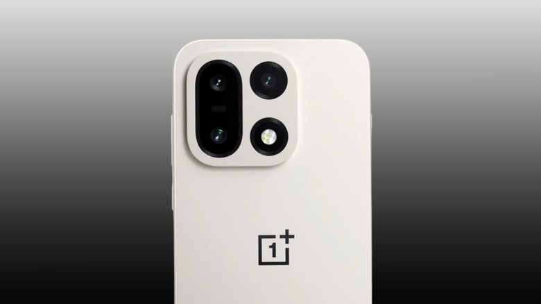 OnePlus 15 camera array on a black to white gradient background