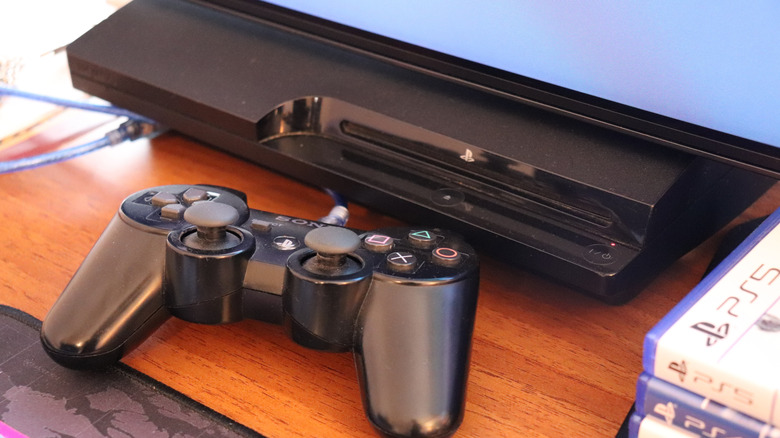 A PS3 and DualShock 3 controller