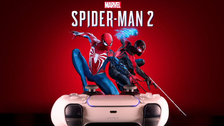 The Marvel Spider-Man 2 poster with the DualSense in the foreground