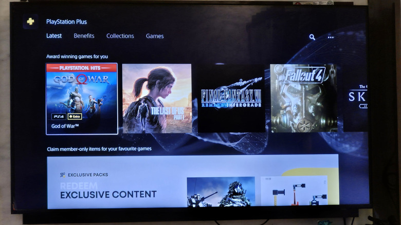 The PS Plus home screen on a TV