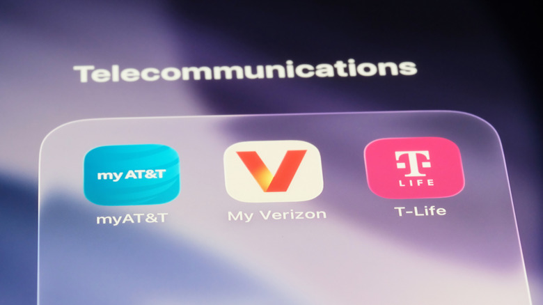 Apps for managing AT&T, T-Mobile, and Verizon accounts appear on an iPhone.