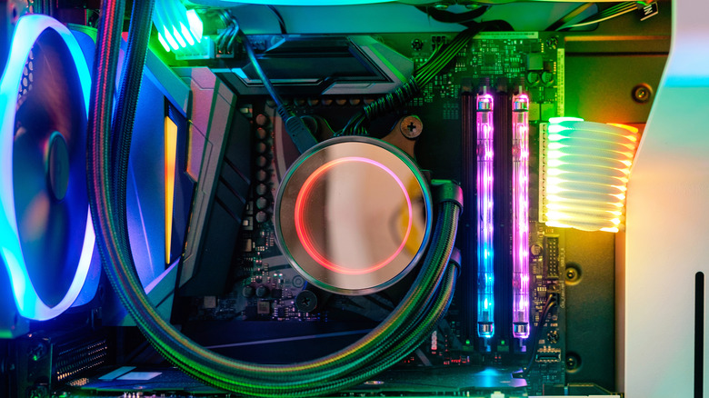 A liquid cooler water pump inside a PC setup