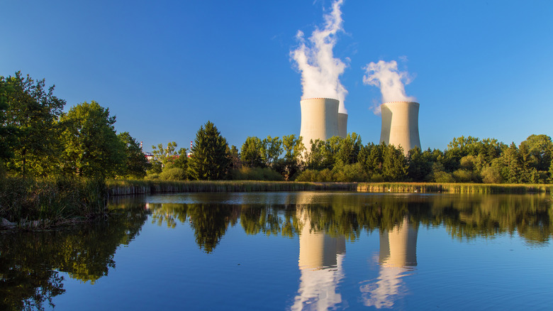 Cooling towers at a nuclear plant near a lake