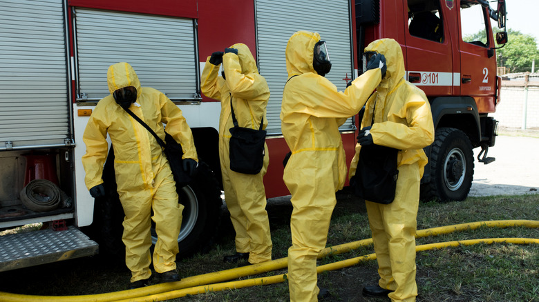 People wearing protective suits for a nuclear power plant drill