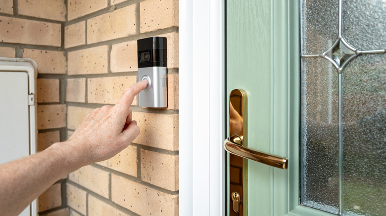 visitor ringing video doorbell