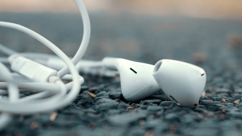 Wired earbuds on the ground