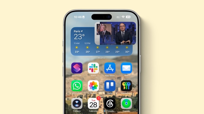 An iPhone mockup with YouTube playing in PiP