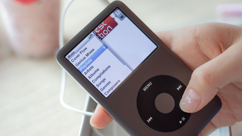 Person using an iPod classic