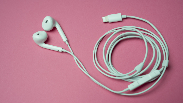 Apple Earpods, Airpods white earphones, headphones for listening to music and podcasts