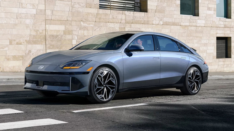 A gray Hyundai Ioniq 6 is pictured on a city street.