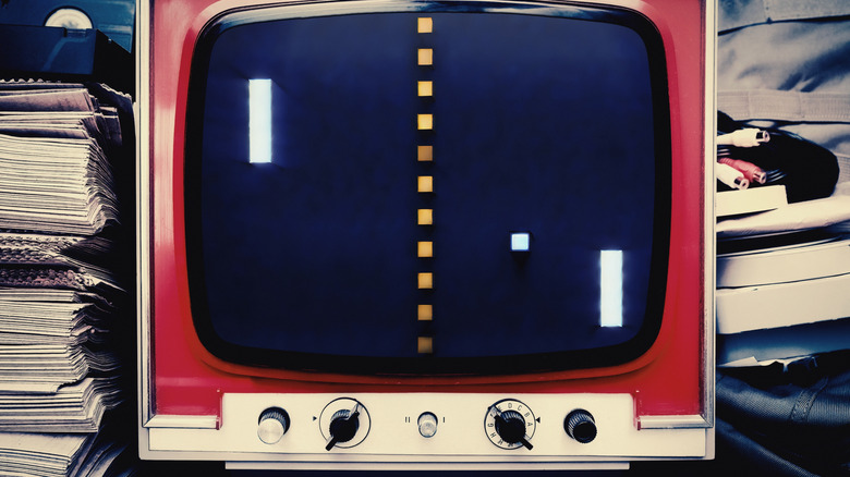 The "Pong" video game being played on an old TV