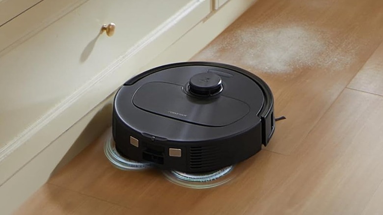 Roborock QV 35A Robot Vacuum mopping a hardwood floor.
