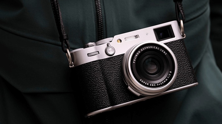 Fujifilm X100VI Camera strapped next to black clothes