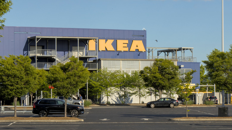 Ikea's blue building behind trees