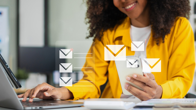 A woman using a laptop and a smartphone. Envelope icons over the image indicate she is looking at her email.
