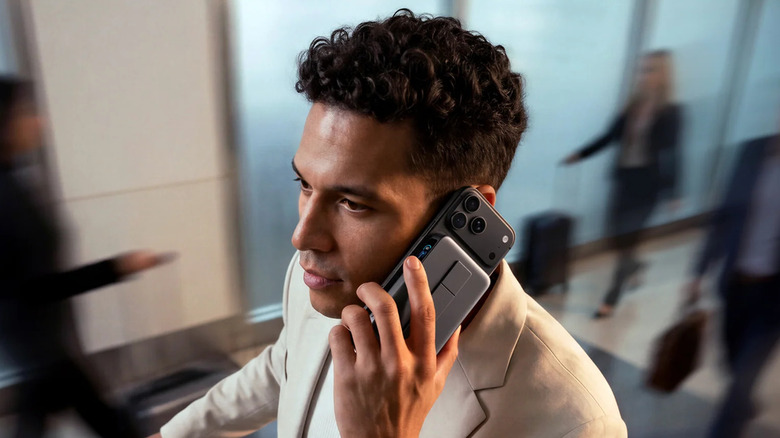 Man using an iPhone with Anker's MagGo 2 Pro case